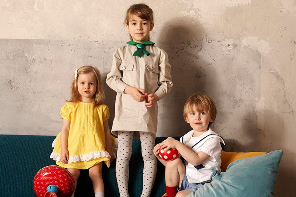Drei Kinder in ELTERN-Dior-Modellen