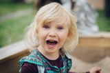 Welcher Spiel-Typ ist dein Kind? Kind mit Tränen in den Augen guckt in die Kamera