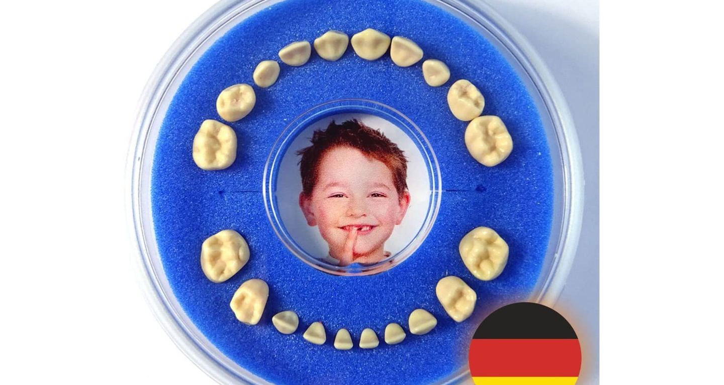 Zahndose mit Schaumstoff-Stecksystem und Kinderbild in der Mitte
