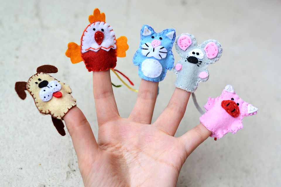Himpelchen und Pimpelchen: Fingerpuppen an einer Hand
